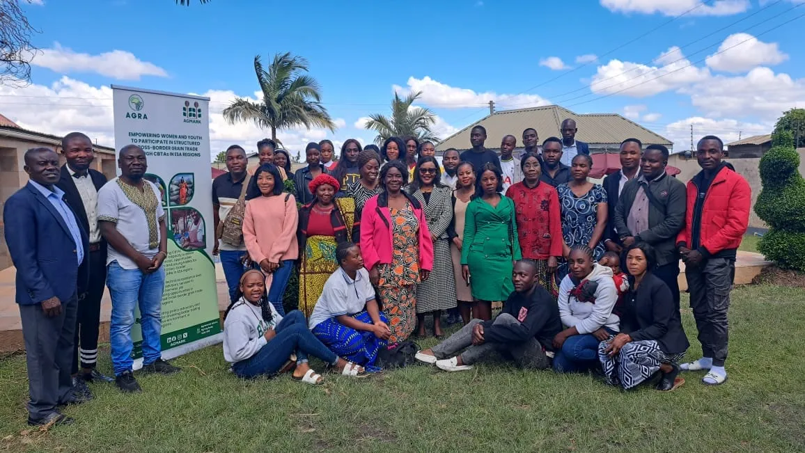 Group photo of grain trade skills training participants outdoors in Nakonde, Zambia