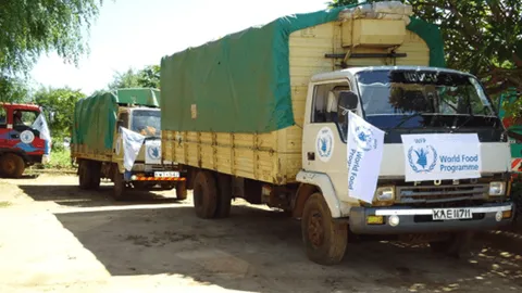 World Food Programme branded trucks loaded with cargo for the 2013 Agricultural Market Access and Linkage Project