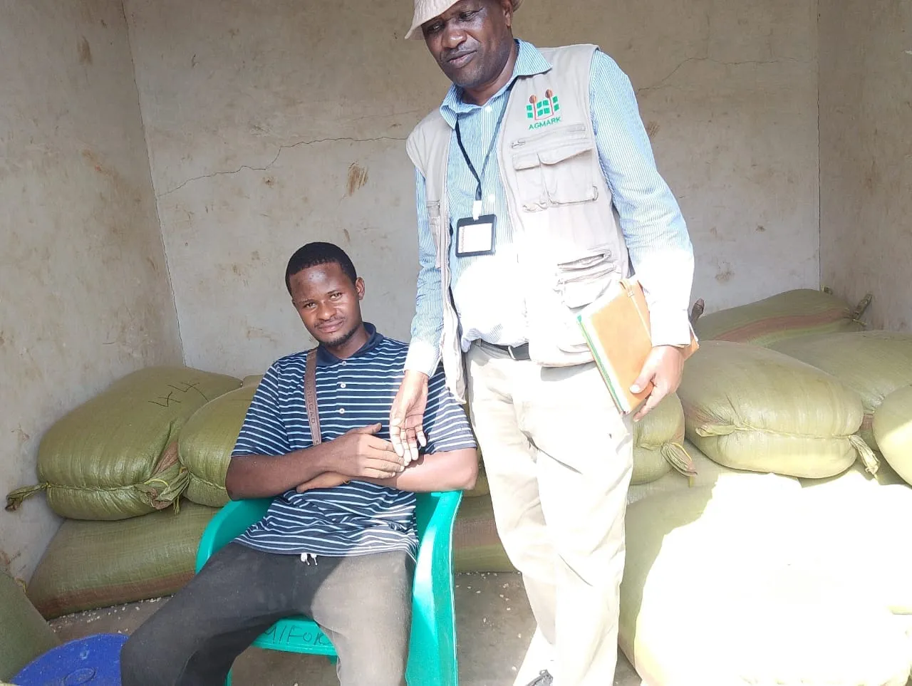 Youth Trader in Grain Storage room, Songwe, Malawi