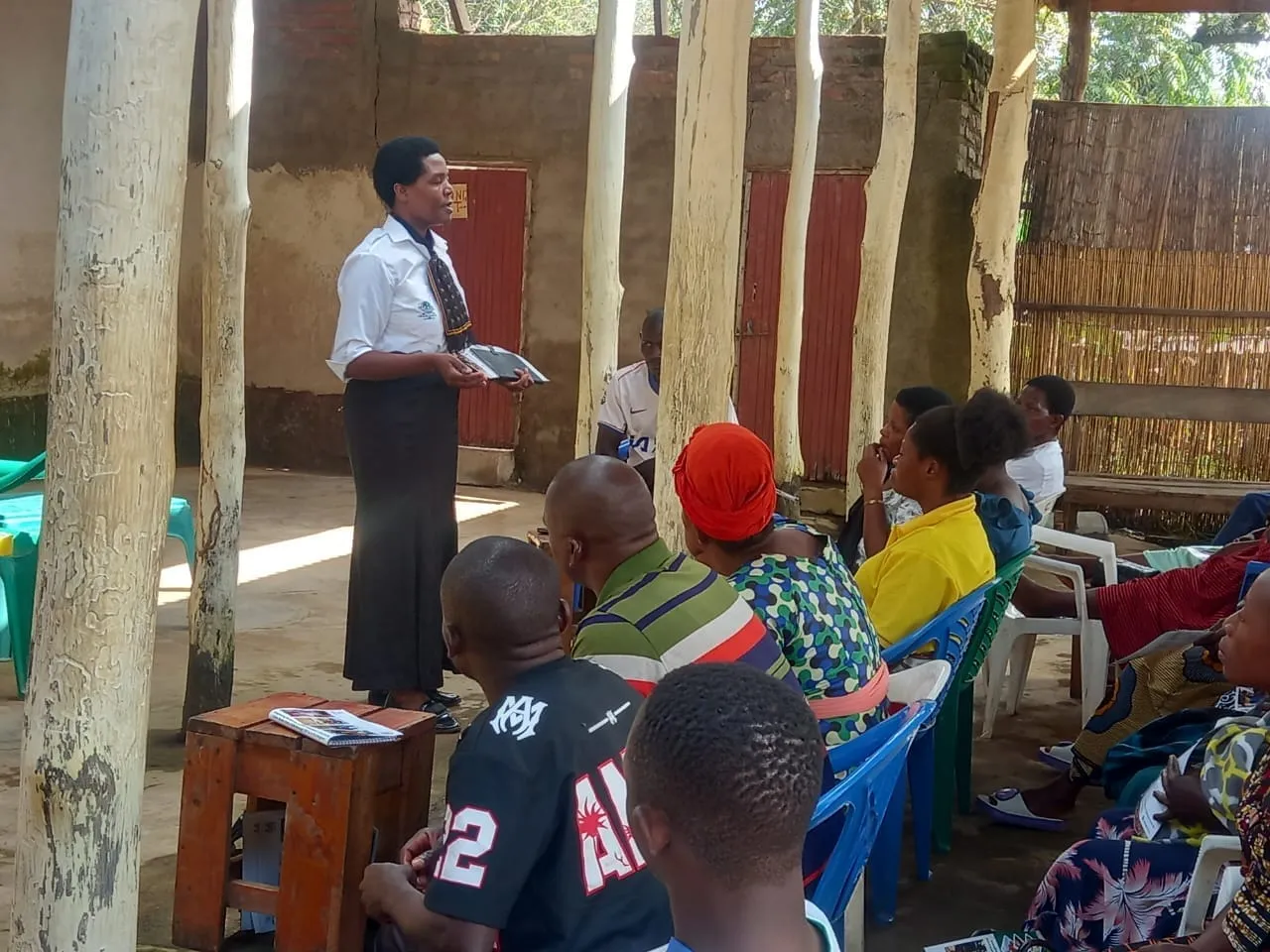 Ms. Christine Mukanadawire, Deputy Officer at the Malawi Revenue Authority, gives a talk to Songwe CBTA members.