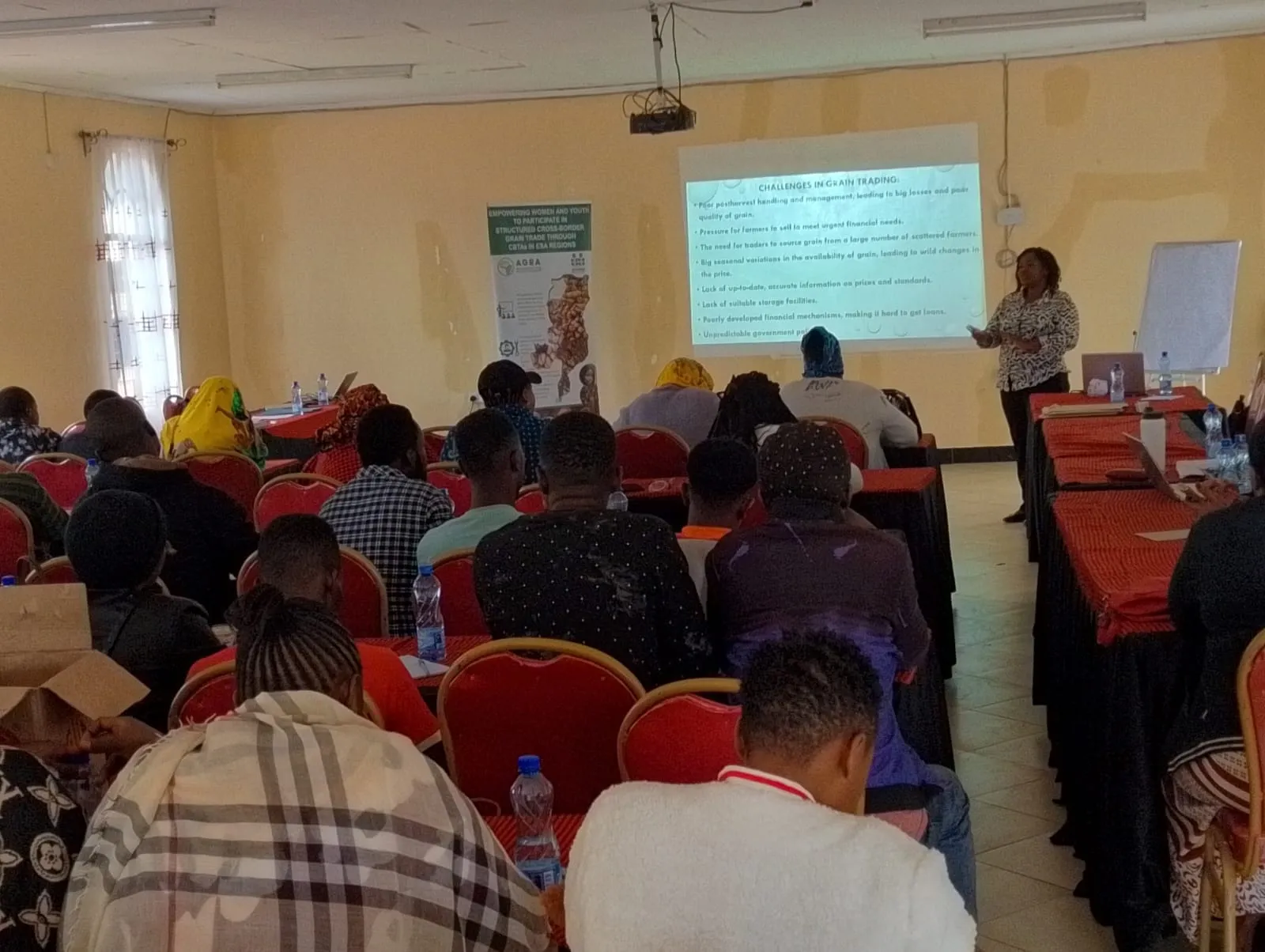 AGMARK trainer, Gertrude Mbura, Leading the class of Tanzanian Traders and Participants | AGMARK Namanga Training