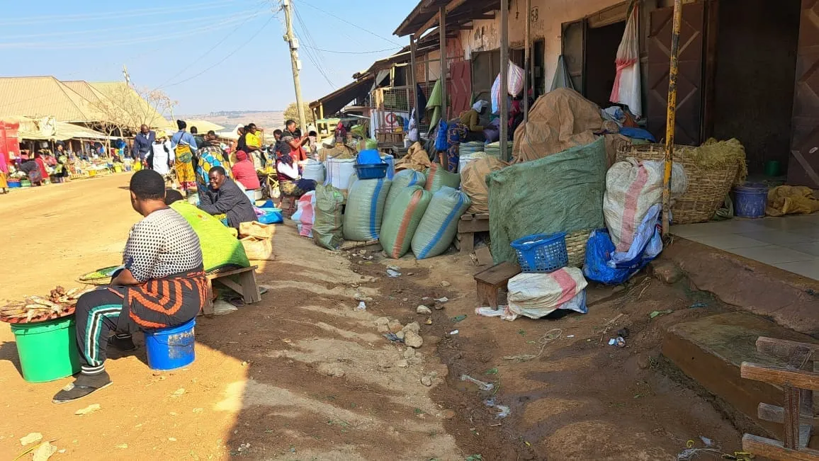 Women selling Grains and other items at Majengo Grain Market, Tunduma, Tanzania.