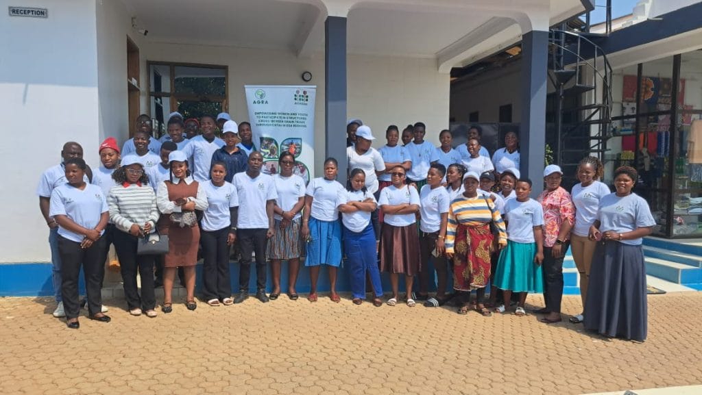 Group photo at Tunduma CBTA training event, promoting grain trade with focus on empowering women and youth, Tanzania Zambia initiative